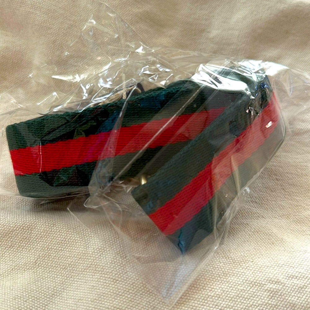 Parker Thatch thin red/green racer stripe strap.